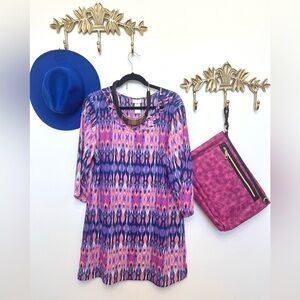 Flowy tunic dress with a vibrant pink-blue ikat print L
